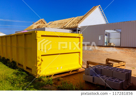 Metal container dumpsters for waste during construction at construction site 117281856