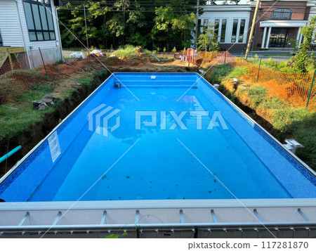 In back yard of house, construction swimming pool will be conducted at ground level In back yard of house, construction swimming pool will be conducted at ground level 117281870