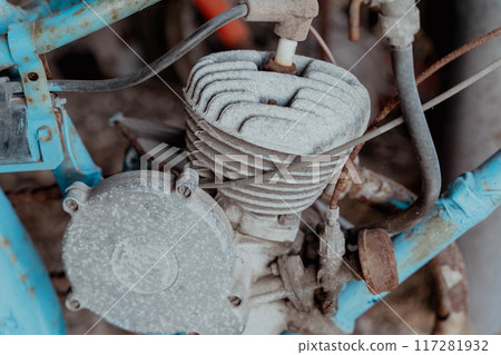 An old engine highlighting intricate mechanical details and textures 117281932