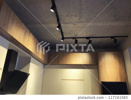 Kitchen lighting, black spot track lights led, interior in modern loft design Kitchen lighting, black spot track lights led, interior in modern loft design 117281985