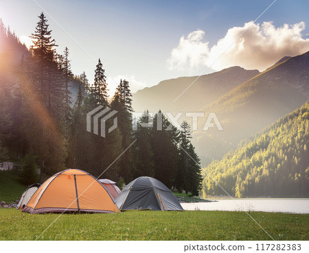 Tranquil Morning Camping by the Lake in the Forest 117282383