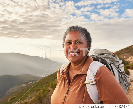 Happy Solo Female Hiker on Mountain Trail: One Woman Smiling 117282485