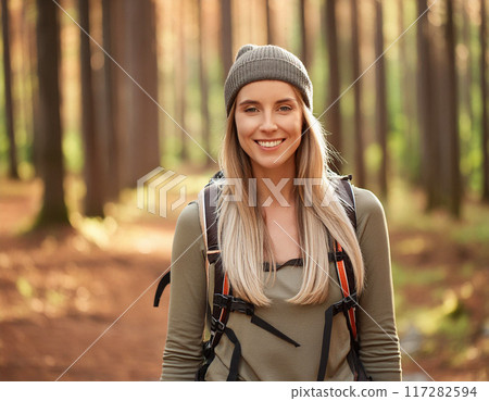 Solo Female Hiker on Forest Trail: One Woman Adventuring Solo Female Hiker on Forest Trail: One Woman Adventuring 117282594