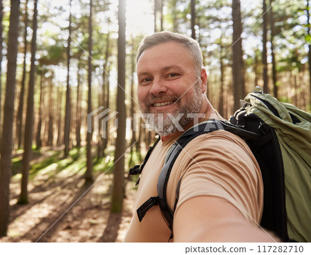 Hiker on a Forest Trail: One Man Adventuring 117282710