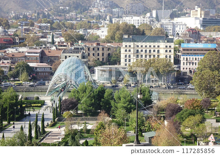 Georgia, Tbilisi, trendy symbol landmark, beautifully deformed green Peace Bridge Georgia, Tbilisi, trendy symbol landmark, beautifully deformed green Peace Bridge 117285856