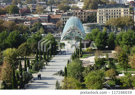 Georgia, Tbilisi, trendy symbol landmark, beautifully deformed green Peace Bridge Georgia, Tbilisi, trendy symbol landmark, beautifully deformed green Peace Bridge 117286039