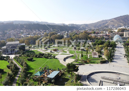 Georgia, Tbilisi, trendy symbol landmark, beautifully deformed green Peace Bridge Georgia, Tbilisi, trendy symbol landmark, beautifully deformed green Peace Bridge 117286043