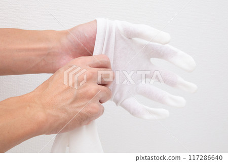 Wear white gloves 117286640