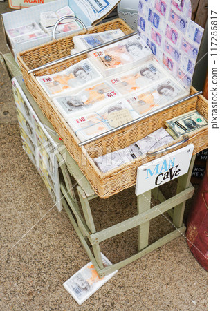 A notepad with a banknote design 117286817