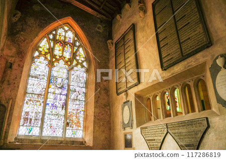 Stained glass inside an old church 117286819