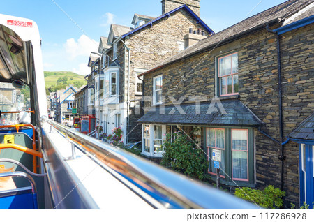 View of the townscape of the Lake District in England from a tourist bus View of the townscape of the Lake District in England from a tourist bus 117286928
