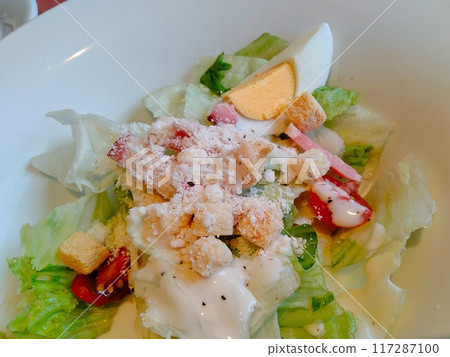 Delicious Caesar salad Delicious Caesar salad 117287100