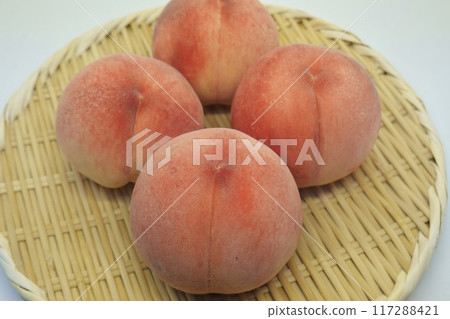 Peaches on a colander Peaches on a colander 117288421