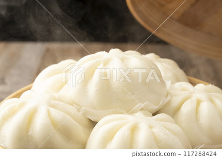 Steamed meat buns Steamed meat buns in a bamboo steamer Steamed meat buns Steamed meat buns in a bamboo steamer 117288424