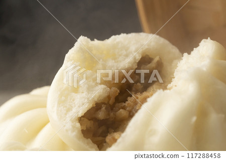Steamed meat buns Steamed meat buns in a bamboo steamer Steamed meat buns Steamed meat buns in a bamboo steamer 117288458