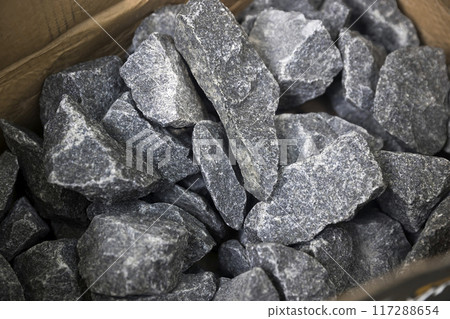 Sauna stones in a cardboard box Sauna stones in a cardboard box 117288654