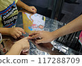 Child's hand pointing 117288709