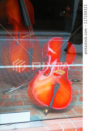 A violin on display in a shop window in Ginza 117289321