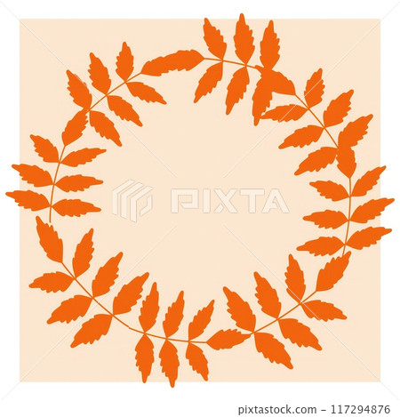 A circular arrangement of vibrant orange leaves creates a decorative wreath against a neutral background. A circular arrangement of vibrant orange leaves creates a decorative wreath against a neutral background. 117294876