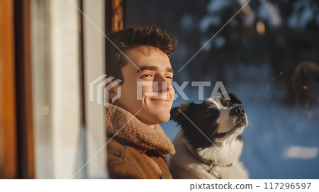 Young Man and His Dog Enjoying Winter Sunrise Together Young Man and His Dog Enjoying Winter Sunrise Together 117296597
