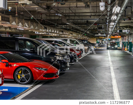 Vehicles lined up in an underground parking lot in central Tokyo Vehicles lined up in an underground parking lot in central Tokyo 117296877