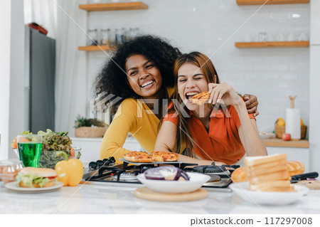 Pride LGBT Family at the kitchen Happy face. Preparing family dinner at home Pride LGBT Family at the kitchen Happy face. Preparing family dinner at home 117297008