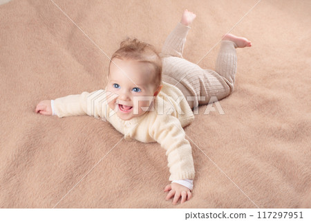 Little baby on white bed Little baby on white bed 117297951