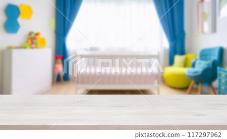 Empty wooden table with blurry baby room background, for design and decoration concepts Empty wooden table with blurry baby room background, for design and decoration concepts 117297962