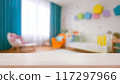 Empty wooden table with blurry baby room background, for design and decoration concepts 117297966