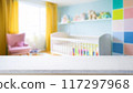 Empty wooden table with blurry baby room background, for design and decoration concepts 117297968