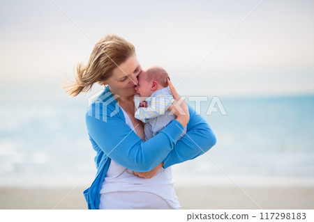 Mother and child on beach. Vacation with baby. Mother and child on beach. Vacation with baby. 117298183