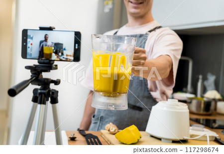 The chef is broadcasting live from workshop how to prepare a vegetarian food 117298674