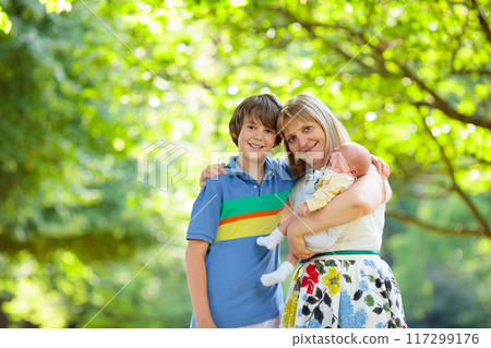 Portrait of happy woman with kids 117299176