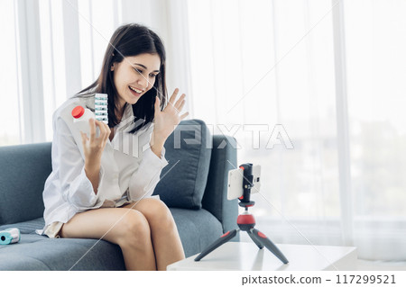 Woman sit down on sofa. healthcare virus protection. health and fever concept. 117299521