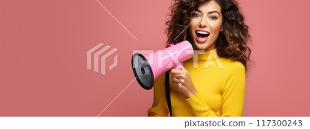 Vibrant promotion - smiling young woman announcing sale offers with megaphone against single colour background, perfect for banner or with ample copy space for text, capturing attention and excitement 117300243