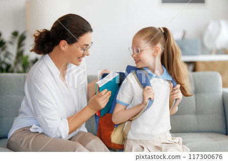 Happy family preparing for school Happy family preparing for school 117300676