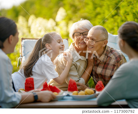 family spending time together in summer morning 117300792