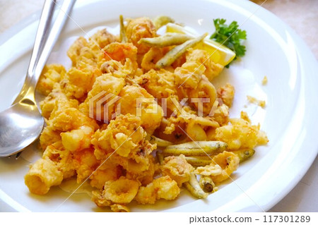 Authentic Italian seafood fritters 117301289
