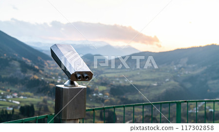 Touristic binoculars overlooking the scenic Artvin region in the Black Sea area, Karadeniz in Turkish, of Turkey, offering panoramic views of the lush autumn landscape 117302858