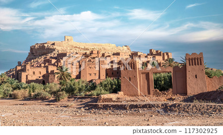 Ait Ben Haddou, an ancient fortified village in Morocco with mud-brick architecture and narrow streets, once a key stop on the Sahara caravan route. 117302925