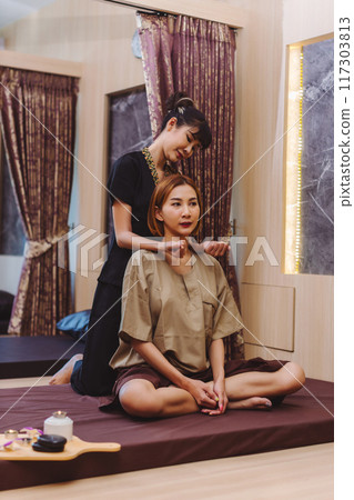 Relaxing with hand massage at beauty spa. Soothing massage 117303813