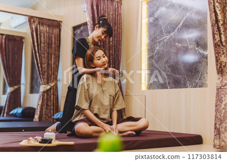 Relaxing with hand massage at beauty spa. Soothing massage 117303814