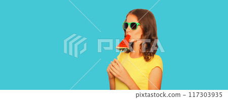 Summer portrait of young woman with fresh juicy fruits, girl eating lollipop or ice cream watermelon Summer portrait of young woman with fresh juicy fruits, girl eating lollipop or ice cream watermelon 117303935