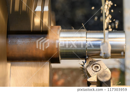 The lathe machine finish cut metal shaft parts with liquid coolant method. The lathe machine finish cut metal shaft parts with liquid coolant method. 117303959
