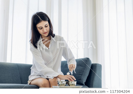 Woman Self healing perform first aid injury after she has been an accident 117304204