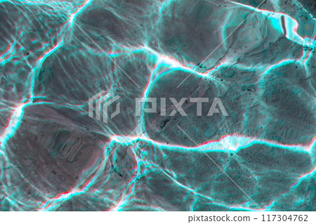 Sun glare on the water in the fountain with an old stone floor, unusual abstract texture 117304762