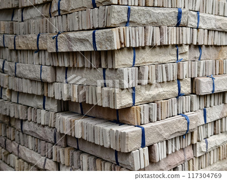 Brick stack tied with ropes for construction and building purposes 117304769