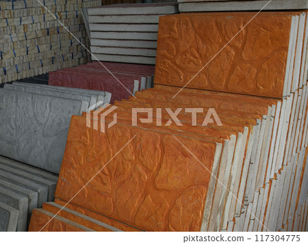 A collection of concrete tile is arranged on one another 117304775