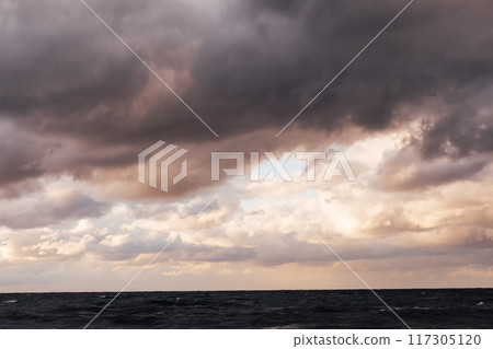 Beautiful landscape storm on sea and sunset with clouds 117305120