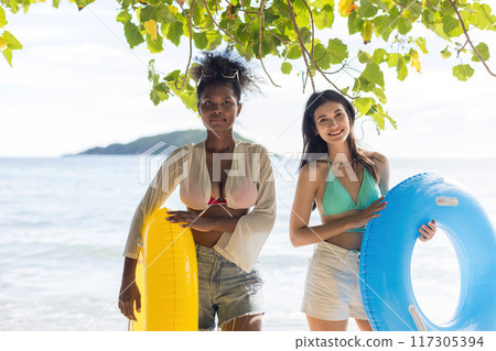 Woman on beach and sand during summer vacation. 117305394